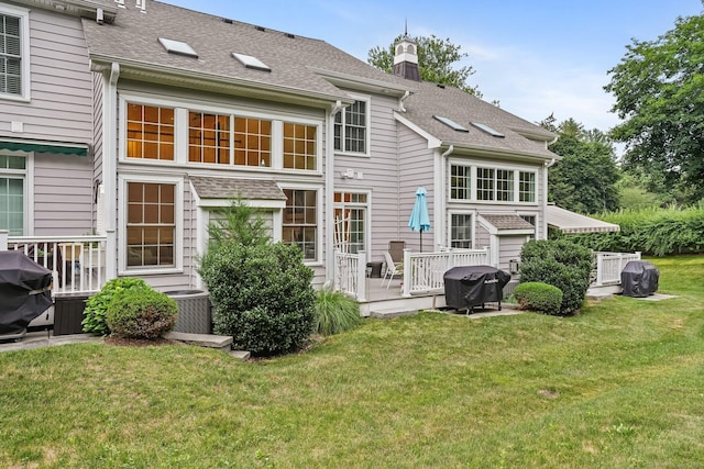7 Still Water Cir Unit 7, Brookfield, CT 06804 - rear view of house with a yard, a deck, and roof with shingles