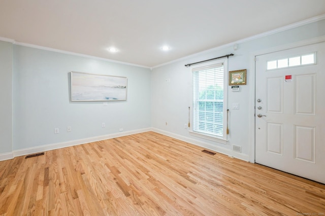 38 Stuart Ave Apt C, Norwalk, CT 06850 - entrance foyer featuring crown molding, light wood finished floors, and recessed lighting