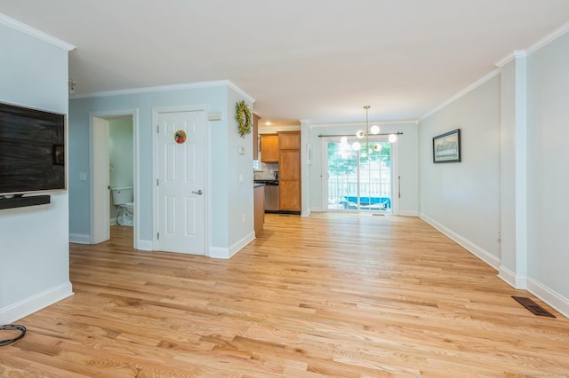 38 Stuart Ave Apt C, Norwalk, CT 06850 - unfurnished living room with light wood-style floors, a chandelier, and crown molding