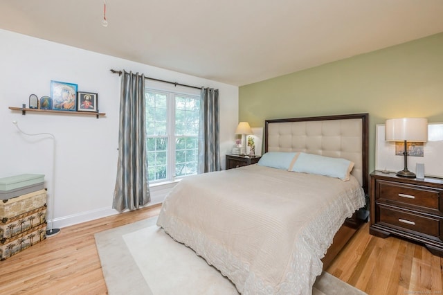 38 Stuart Ave Apt C, Norwalk, CT 06850 - bedroom featuring wood finished floors and baseboards