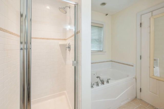 38 Stuart Ave Apt C, Norwalk, CT 06850 - full bathroom featuring a bath, a stall shower, and tile patterned flooring