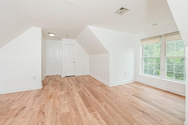 38 Stuart Ave Apt C, Norwalk, CT 06850 - additional living space with light wood-type flooring and lofted ceiling