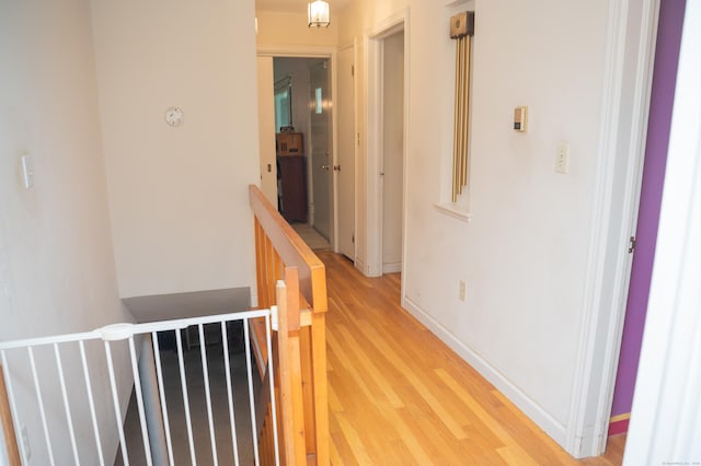 780 Ridge Rd, Hamden, CT 06517 - corridor featuring an upstairs landing and light wood-style floors