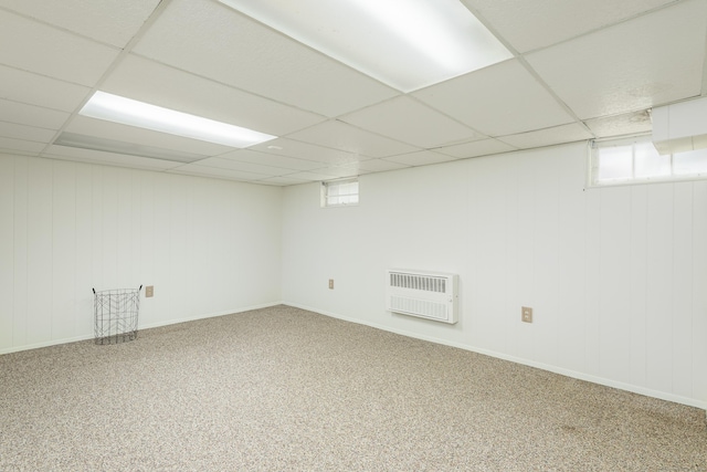 92 Grove Beach Rd S, Westbrook, CT 06498 - basement with heating unit, healthy amount of natural light, a paneled ceiling, and carpet flooring