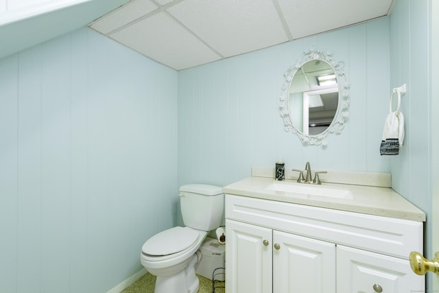 92 Grove Beach Rd S, Westbrook, CT 06498 - half bathroom with vanity, a paneled ceiling, and a decorative wall