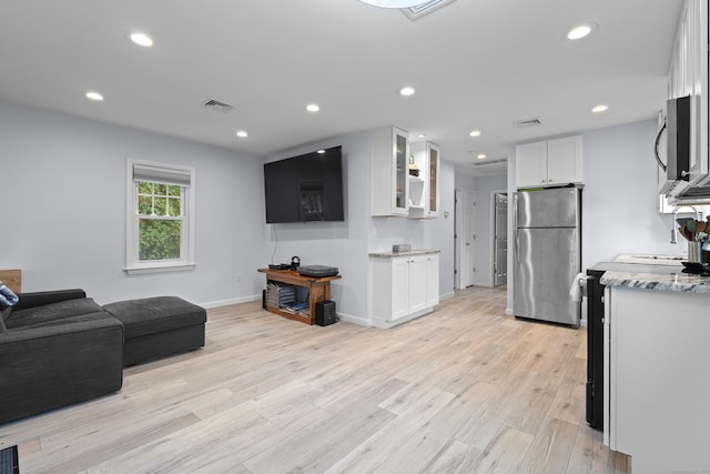 5 Fuller Ct, East Lyme, CT 06357 - living area featuring light wood-style floors and recessed lighting