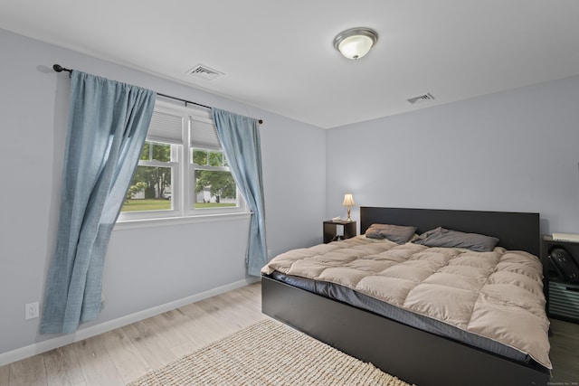5 Fuller Ct, East Lyme, CT 06357 - bedroom with baseboards and wood finished floors
