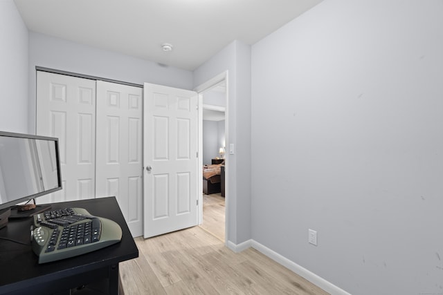 5 Fuller Ct, East Lyme, CT 06357 - bedroom featuring light wood finished floors, a desk, and a closet