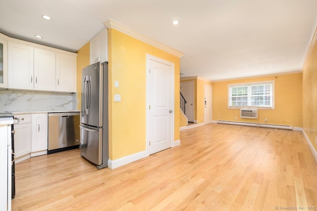 1197 Hope St Apt 7, Stamford, CT 06907 - kitchen featuring stainless steel appliances, a baseboard radiator, white cabinets, ornamental molding, and light wood-type flooring