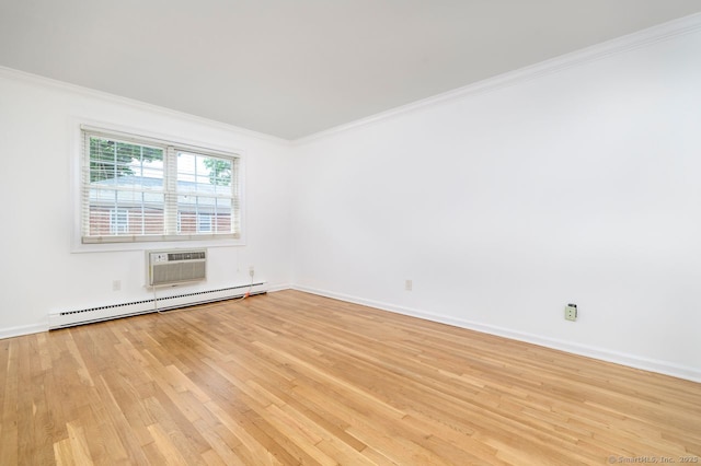 1197 Hope St Apt 7, Stamford, CT 06907 - spare room featuring a baseboard heating unit, crown molding, light wood-style floors, and a wall unit AC