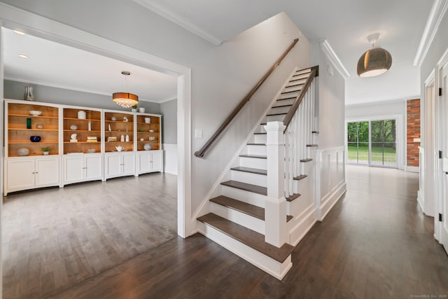 98A Tower Rd, Brookfield, CT 06804 - stairs with wood finished floors, crown molding, and a chandelier