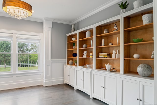 98A Tower Rd, Brookfield, CT 06804 - detailed view of wood finished floors, crown molding, and a chandelier