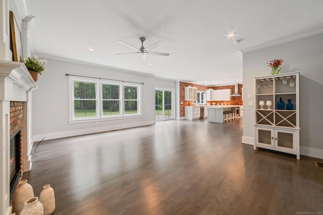 98A Tower Rd, Brookfield, CT 06804 - unfurnished living room featuring ceiling fan, ornamental molding, a brick fireplace, dark wood-style floors, and recessed lighting
