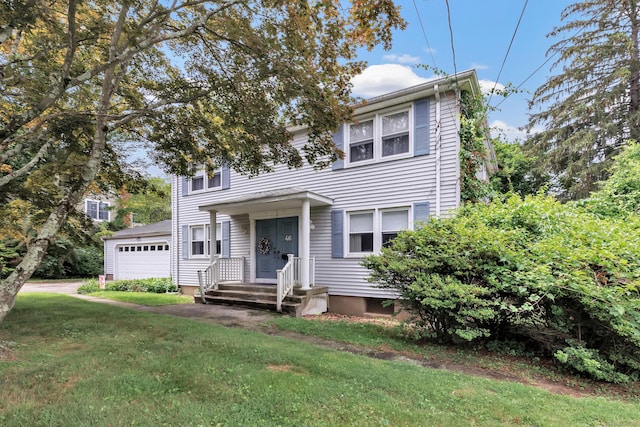 46 W St, Shelton, CT 06484 - view of front of property featuring a garage and a front lawn