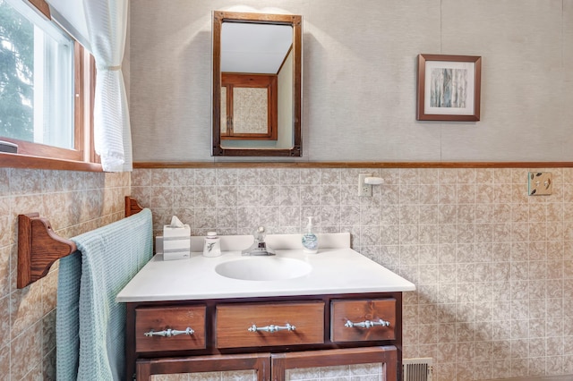 46 W St, Shelton, CT 06484 - bathroom featuring vanity and tile walls