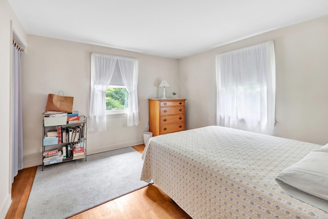 46 W St, Shelton, CT 06484 - bedroom featuring light wood-style floors and baseboards