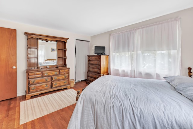 46 W St, Shelton, CT 06484 - bedroom featuring multiple windows and wood finished floors