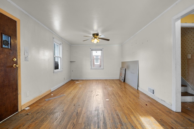 484 Reitter St W, Stratford, CT 06614 - unfurnished living room featuring crown molding, ceiling fan, and hardwood / wood-style flooring