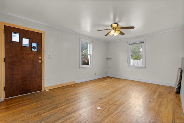 484 Reitter St W, Stratford, CT 06614 - entryway with crown molding, a ceiling fan, light wood-style floors, and plenty of natural light