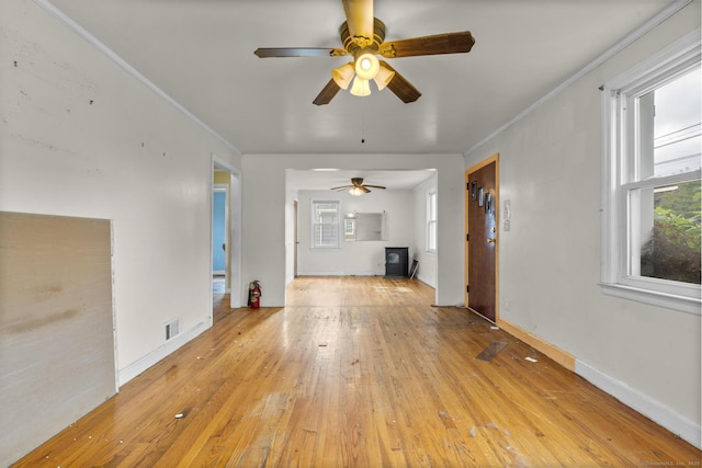484 Reitter St W, Stratford, CT 06614 - unfurnished living room with a ceiling fan, healthy amount of natural light, light wood-style floors, and ornamental molding