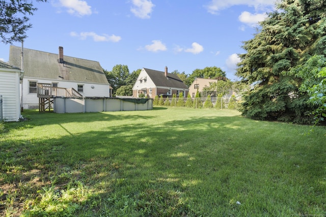 484 Reitter St W, Stratford, CT 06614 - view of yard with a wooden deck and a covered pool