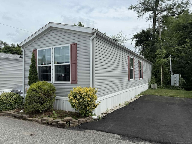 441 Main St Lot 1005, East Hartford, CT 06111 - view of side of property with a cooling unit