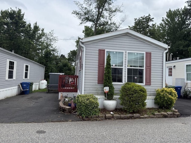 441 Main St Lot 1005, East Hartford, CT 06111 - view of property exterior featuring a wooden deck