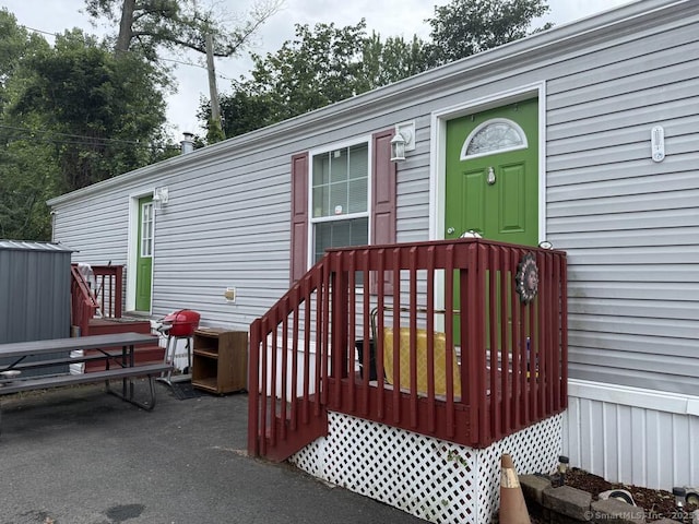 441 Main St Lot 1005, East Hartford, CT 06111 - doorway to property featuring a wooden deck