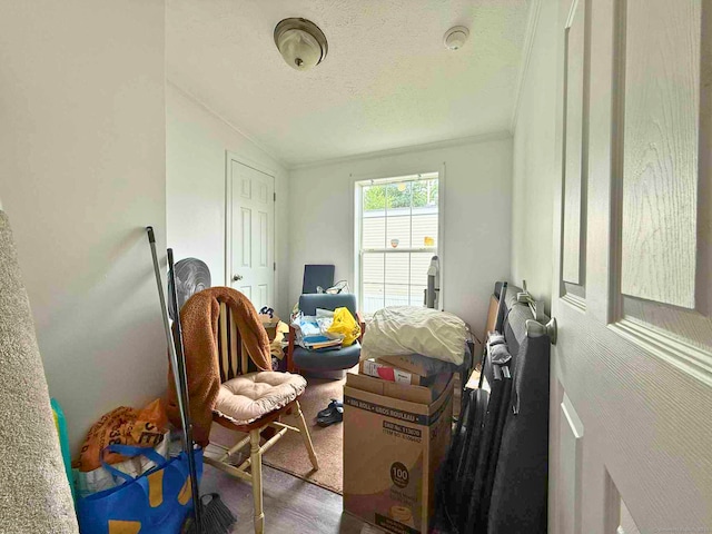 441 Main St Lot 1005, East Hartford, CT 06111 - bedroom with wood finished floors and a textured ceiling