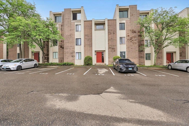 142 Burgundy Hill Ln Unit 142, Middletown, CT 06457 - view of building exterior with uncovered parking
