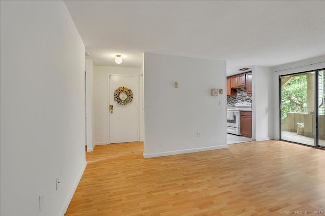 142 Burgundy Hill Ln Unit 142, Middletown, CT 06457 - unfurnished living room with light wood-style flooring