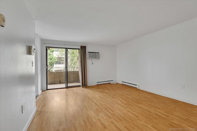 142 Burgundy Hill Ln Unit 142, Middletown, CT 06457 - empty room featuring a baseboard radiator, a baseboard heating unit, and light wood-style floors
