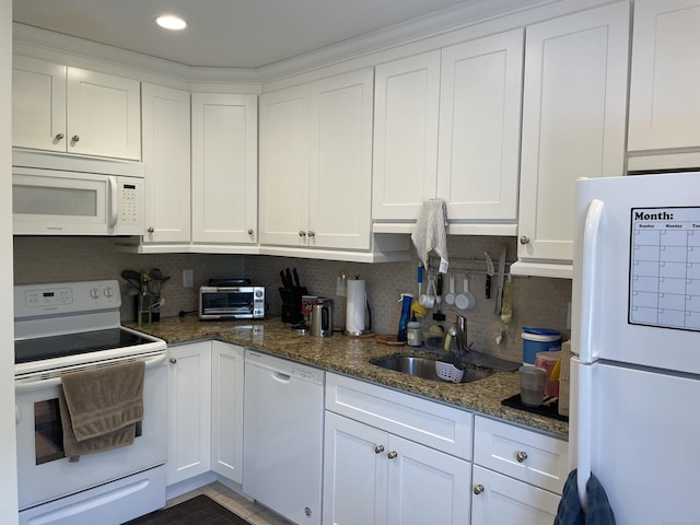 2289 Bedford St Unit A6, Stamford, CT 06905 - kitchen featuring white appliances, white cabinets, tasteful backsplash, dark stone counters, and recessed lighting