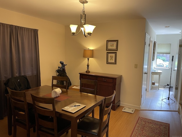 2289 Bedford St Unit A6, Stamford, CT 06905 - dining room featuring a chandelier and light wood-type flooring