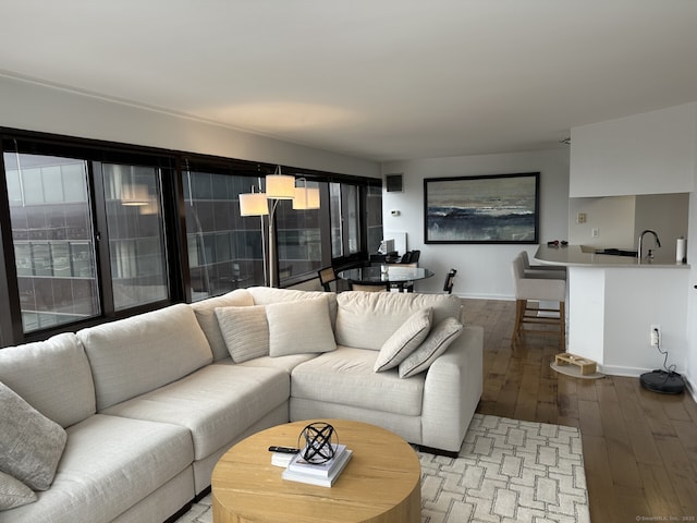 127 Greyrock Pl Apt 1401, Stamford, CT 06901 - living room with hardwood / wood-style flooring and baseboards