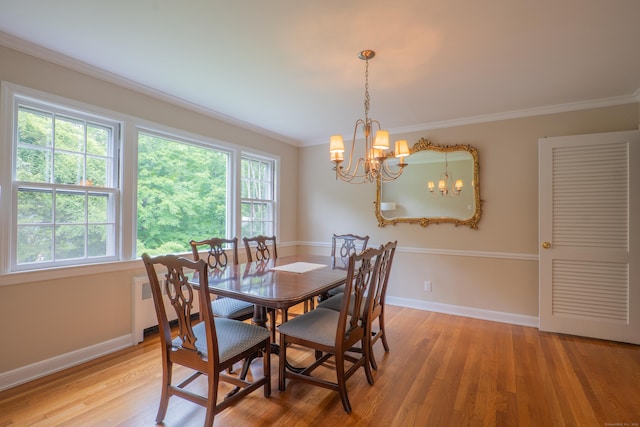 226 Stanwich Rd, Greenwich, CT 06830 - dining room featuring a chandelier, light wood-style floors, ornamental molding, and radiator heating unit