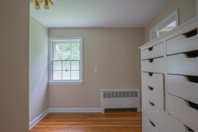 226 Stanwich Rd, Greenwich, CT 06830 - unfurnished bedroom with radiator heating unit and light wood-type flooring