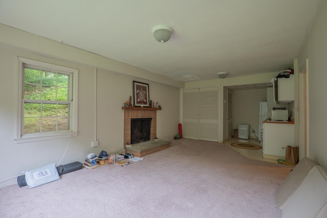 226 Stanwich Rd, Greenwich, CT 06830 - unfurnished living room with carpet flooring and a fireplace