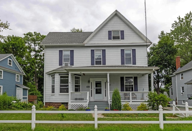 47 Silver St, Middletown, CT 06457 - view of front facade featuring covered porch and a fenced front yard