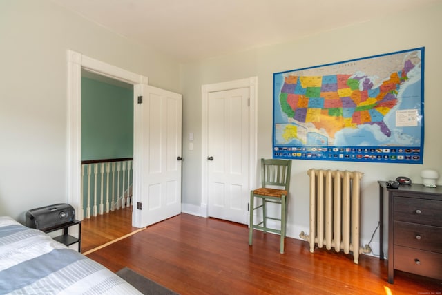 47 Silver St, Middletown, CT 06457 - bedroom featuring radiator heating unit and wood finished floors