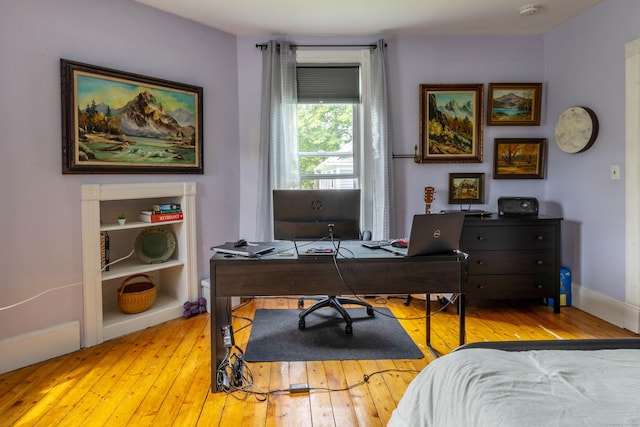 47 Silver St, Middletown, CT 06457 - bedroom with light wood-type flooring and an office area
