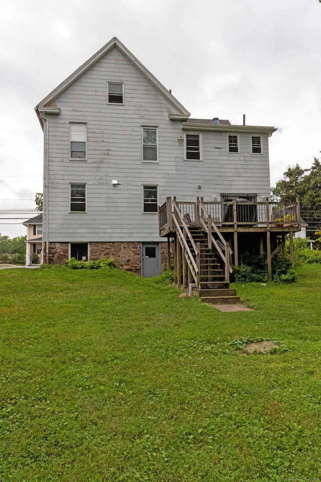 47 Silver St, Middletown, CT 06457 - back of house featuring stairway, a wooden deck, and a lawn