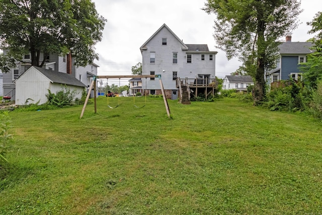 47 Silver St, Middletown, CT 06457 - rear view of house featuring a yard, stairs, and a wooden deck