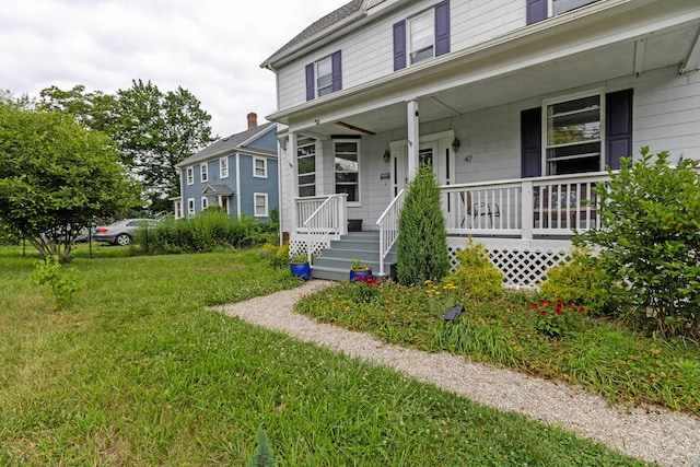 47 Silver St, Middletown, CT 06457 - view of front facade featuring covered porch and a front lawn
