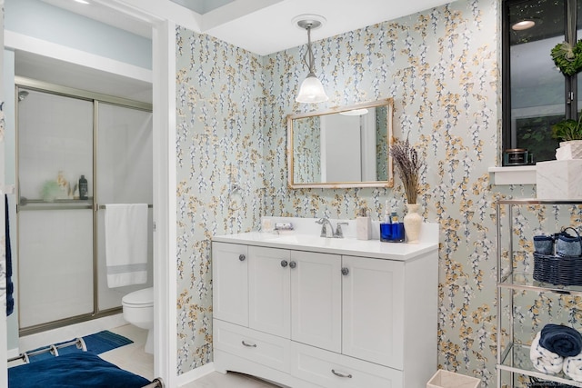 583 Heritage Vlg Unit A, Southbury, CT 06488 - bathroom with wallpapered walls, vanity, and a shower stall