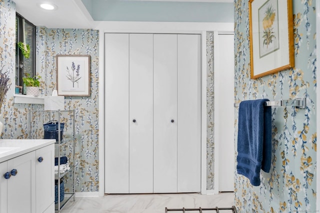 583 Heritage Vlg Unit A, Southbury, CT 06488 - bathroom with wallpapered walls and vanity