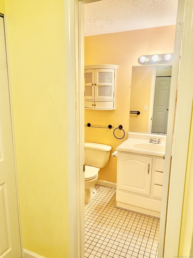 4 Heather Rdg Unit 4, Shelton, CT 06484 - bathroom featuring tile patterned flooring, vanity, and a textured ceiling
