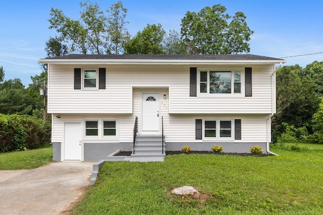 231 Lincolndale Dr, Waterbury, CT 06704 - split foyer home featuring a front yard and entry steps
