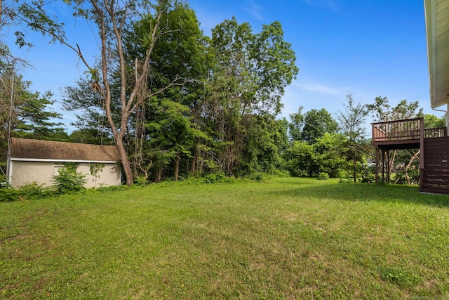 231 Lincolndale Dr, Waterbury, CT 06704 - view of grassy yard featuring a wooden deck