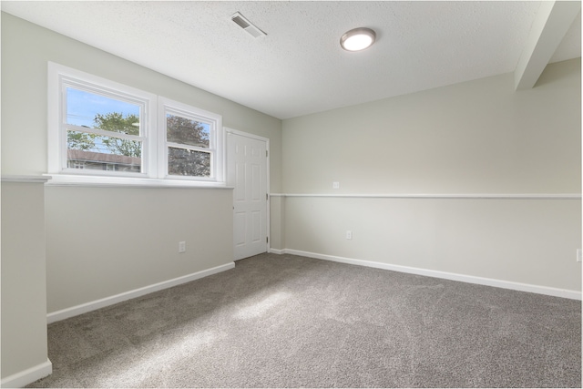 231 Lincolndale Dr, Waterbury, CT 06704 - empty room featuring carpet flooring and a textured ceiling